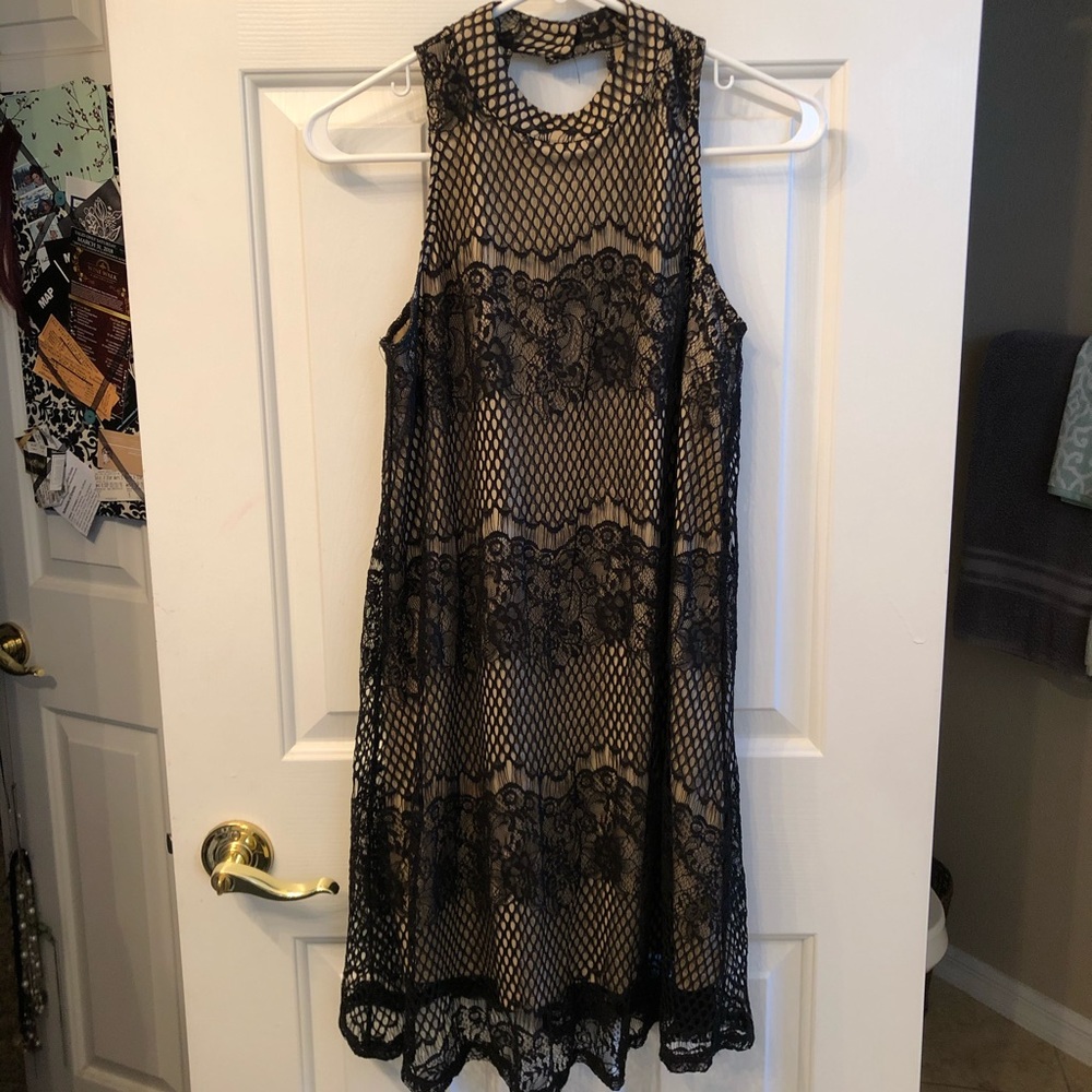 Cute mini dress with lacey mesh overlay